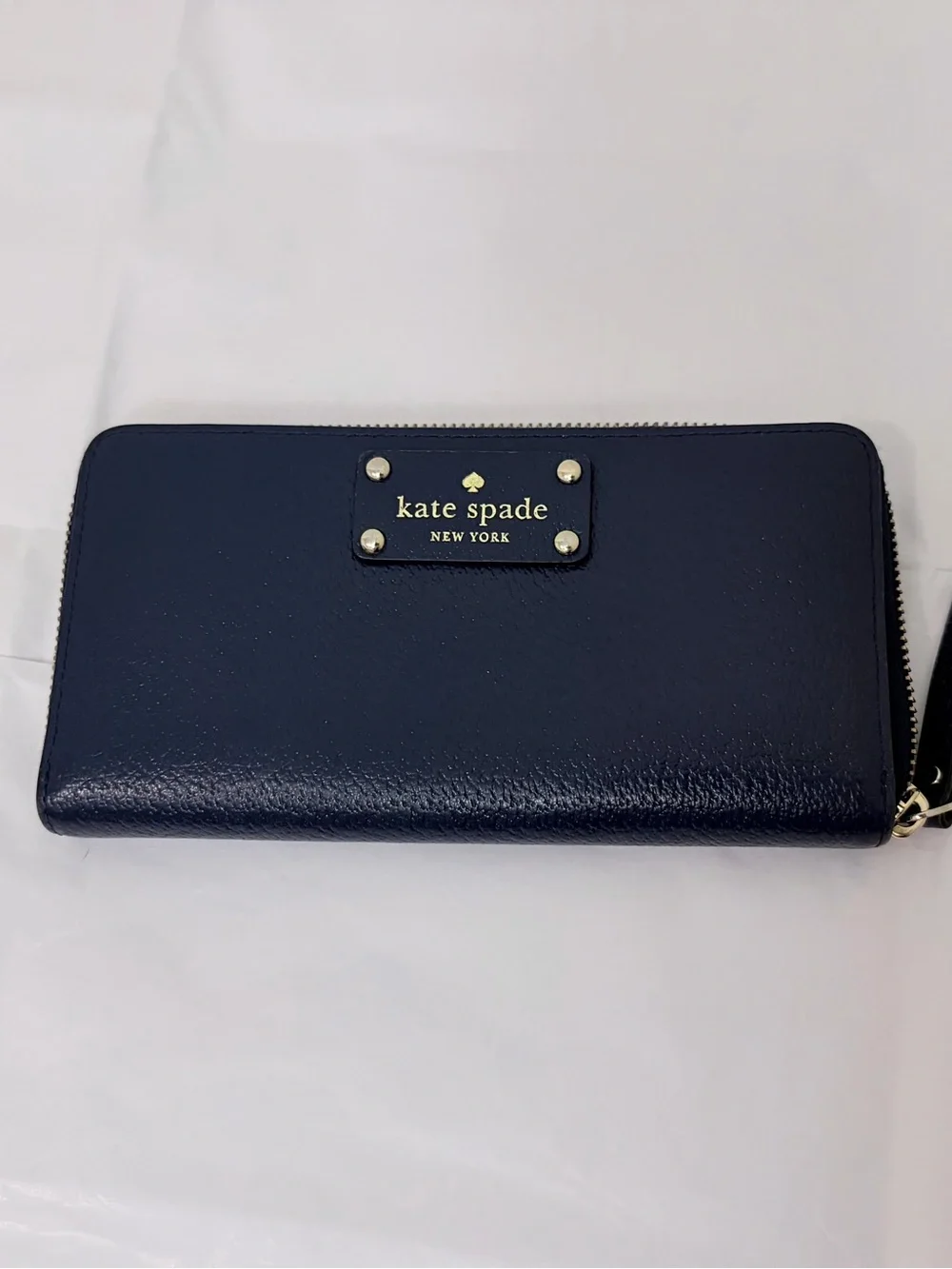 kate spade navy zip-around leather continental wallet